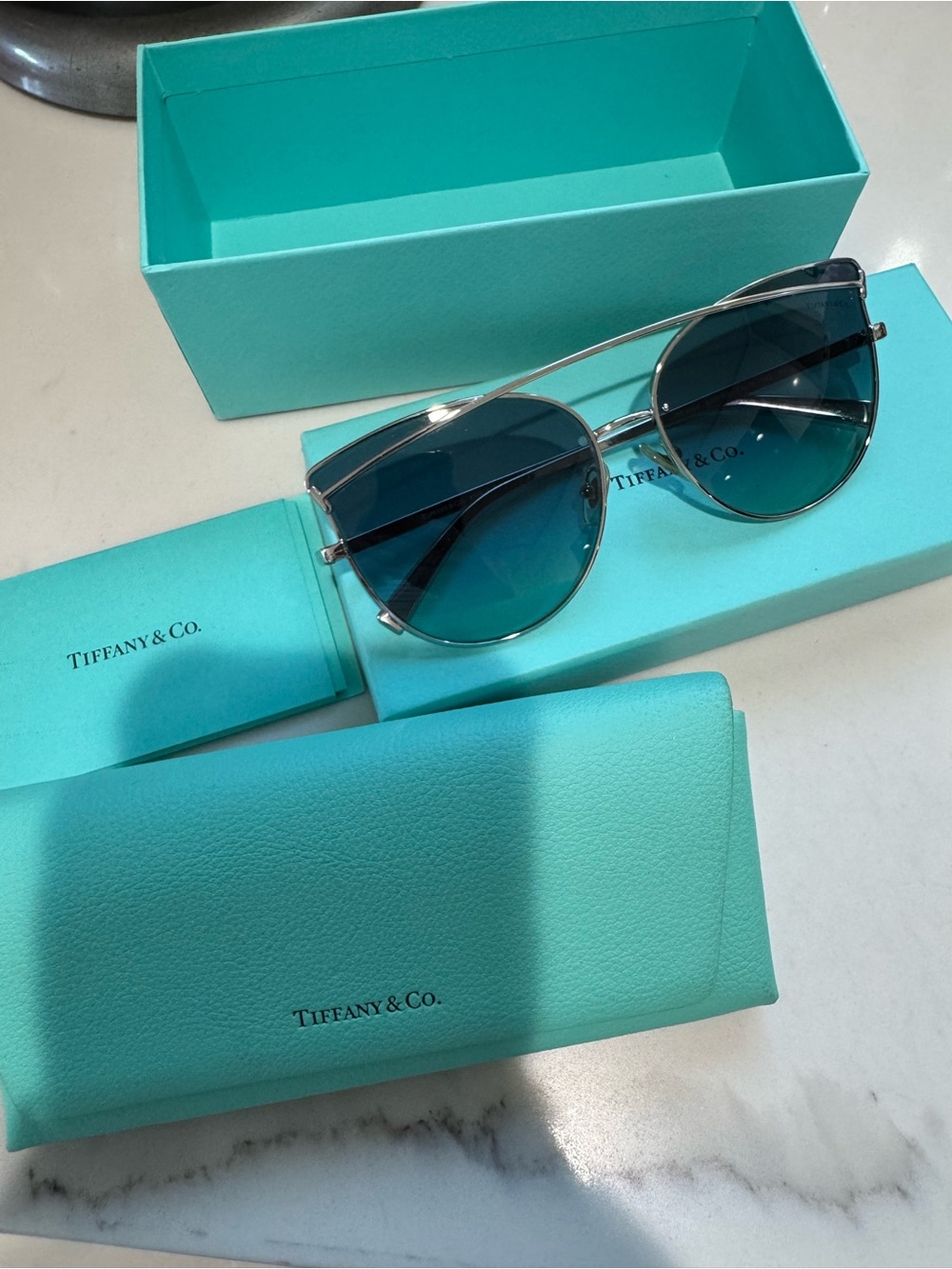 Tiffany & Co. Silver Frame Sunglasses with Blue Lenses